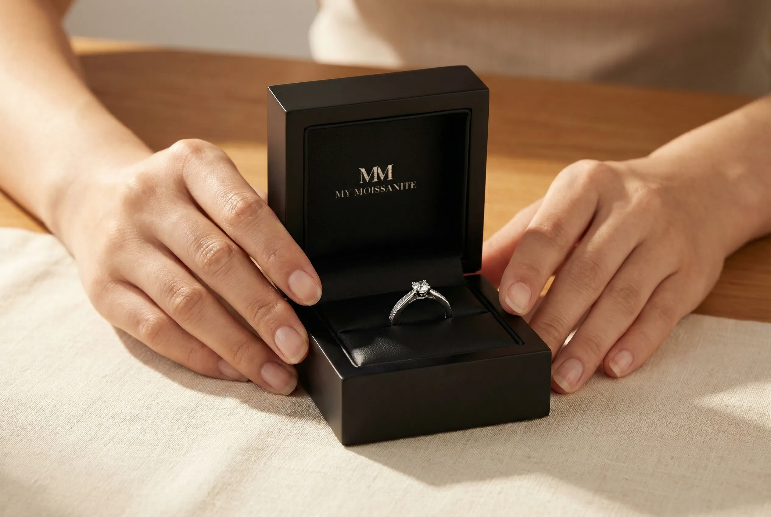 Jewelry specialist presenting a piece in warm natural light